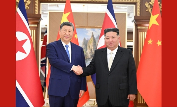 习近平同金正恩举行会谈